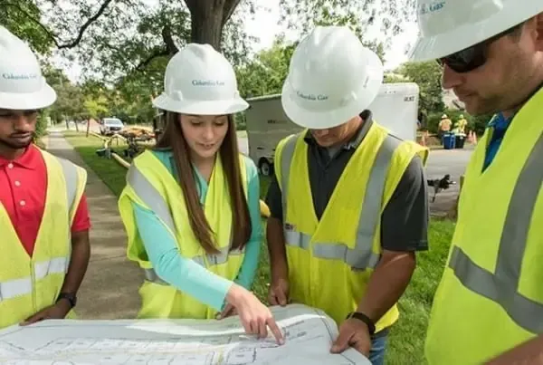 Natural Gas workers discussing plans