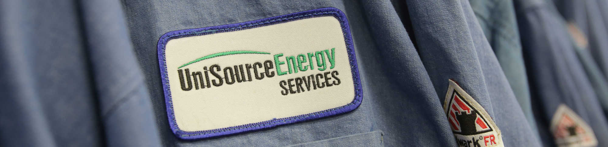UniSource energy workers shirt tag