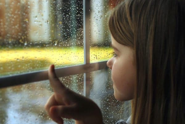 Child rainy window